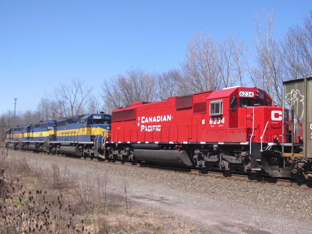 CP 6234 dead in tow behind a trio of ICE/DME power